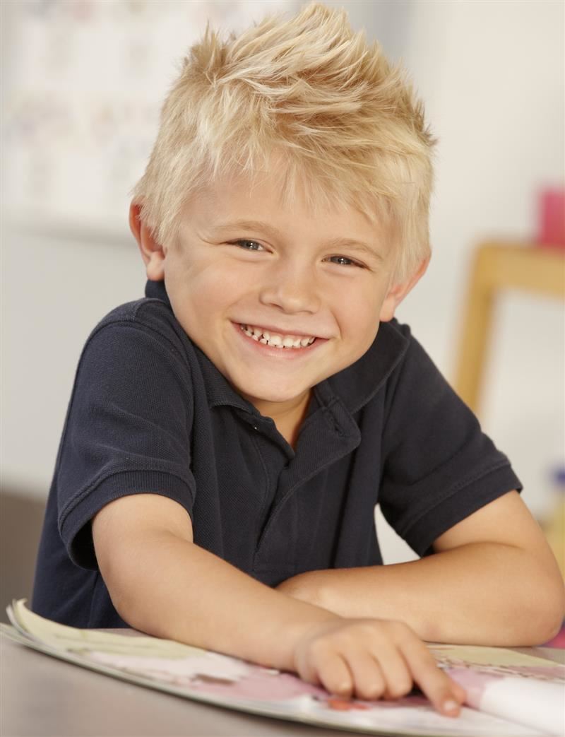 Smiling Boy Reading Smiling Boy Reading